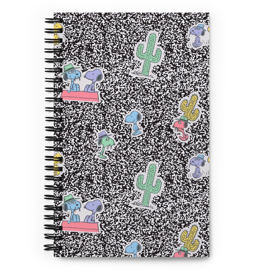 A spiral notebook with cartoon characters on it

Description automatically generated